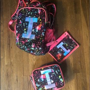 Initial I backpack, pencil case and lunch box.